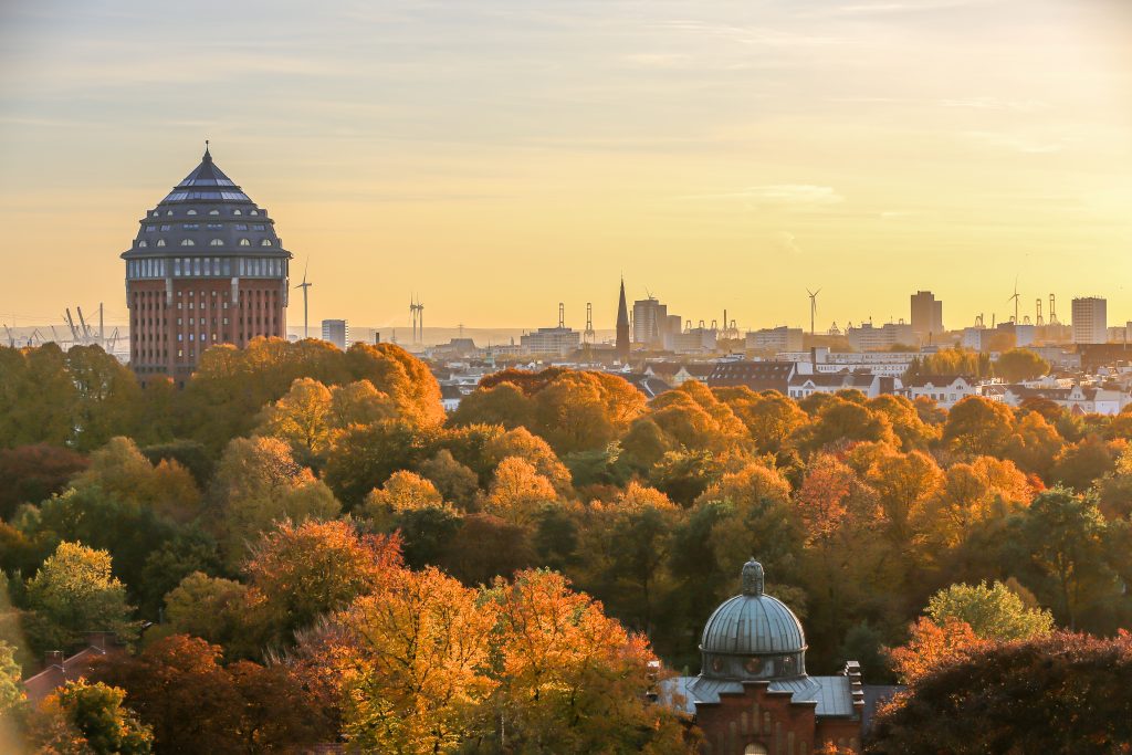 the hamburg schanzenpark with the historic water tower in autumn